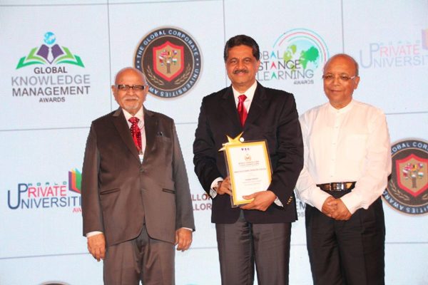 THUMBAY MOIDEEN CONFERRED WITH AN “AWARD FOR OUTSTANDING CONTRIBUTION TO EDUCATION” AT THE WORLD CHANCELLORS CONGRESS 2014 HELD IN MUMBAI.